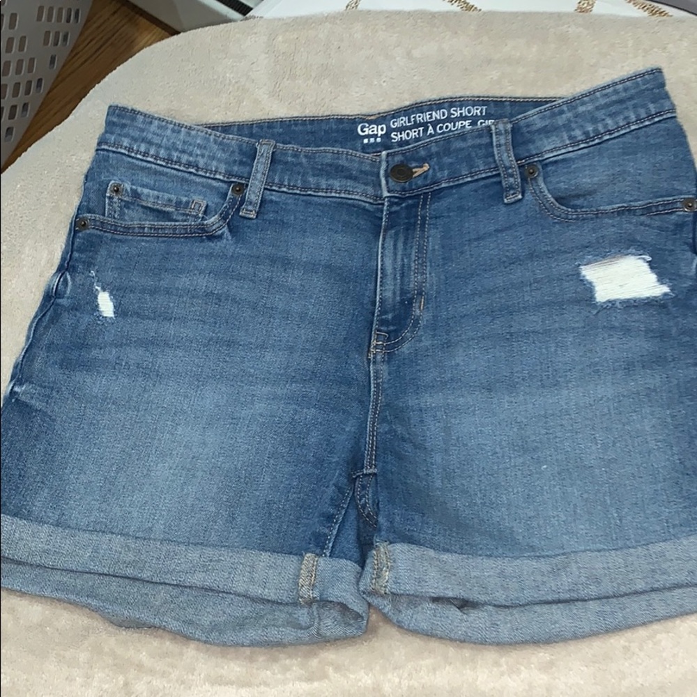 Slightly distressed denim shorts